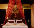 Srivijaya Beach Front Pool Villa Bedroom - The Briza Beach Resort & Spa